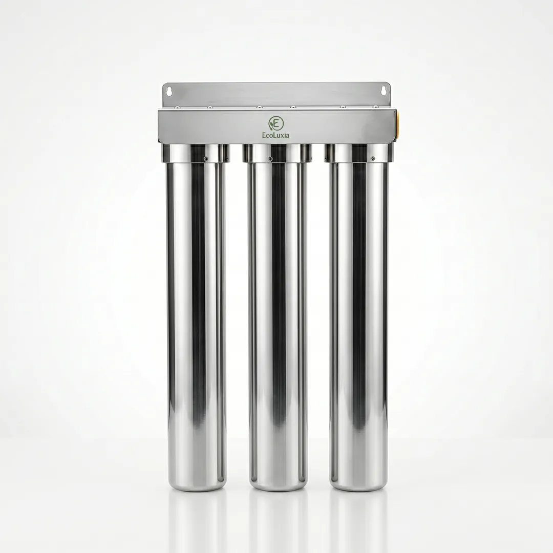 A three-housing stainless-steel filtration system, front view.